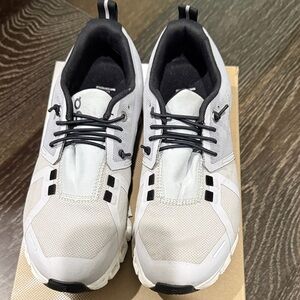 On Running Women’s White and Black Athletic Shoes